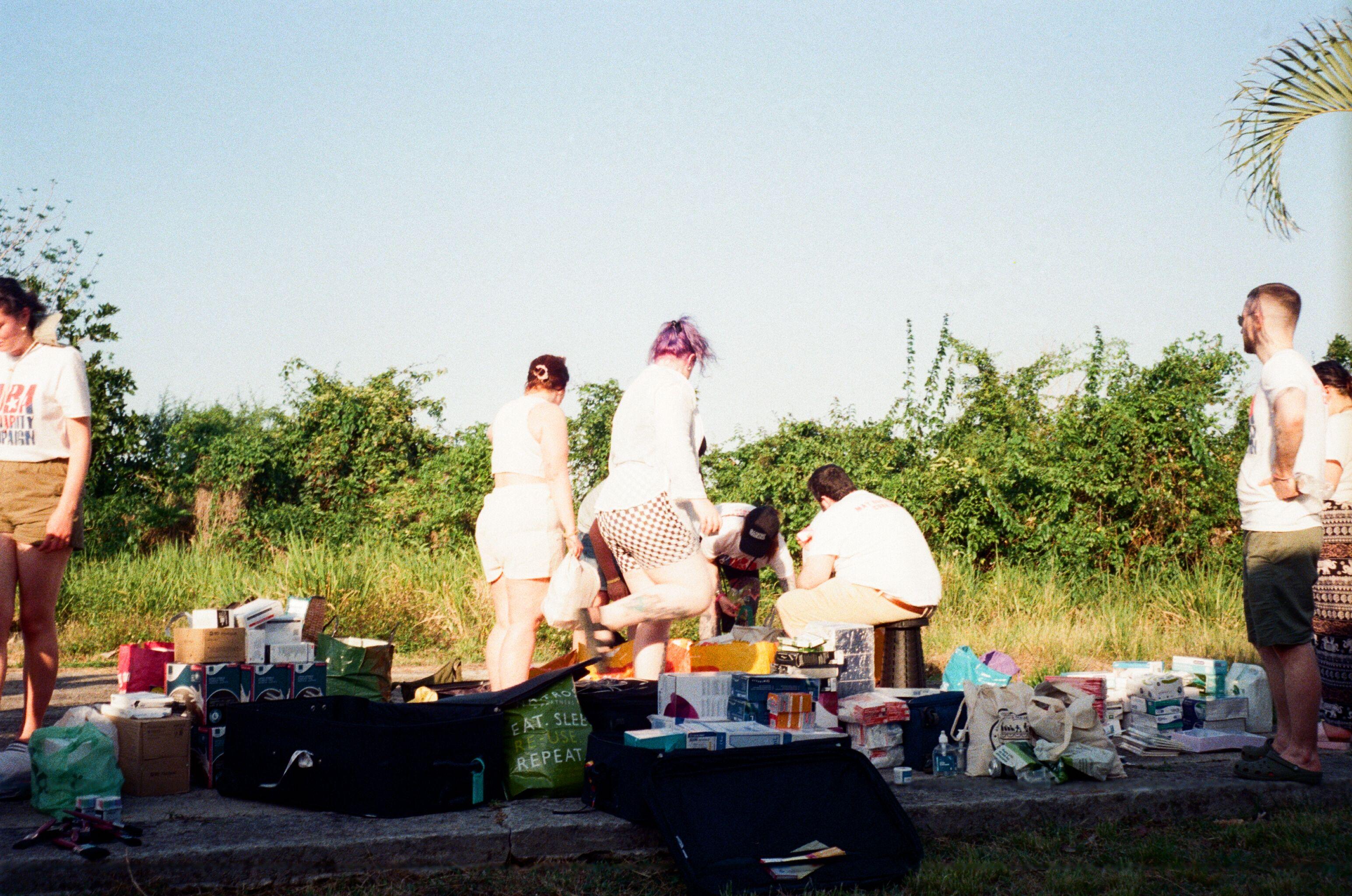 People stood around a picnic