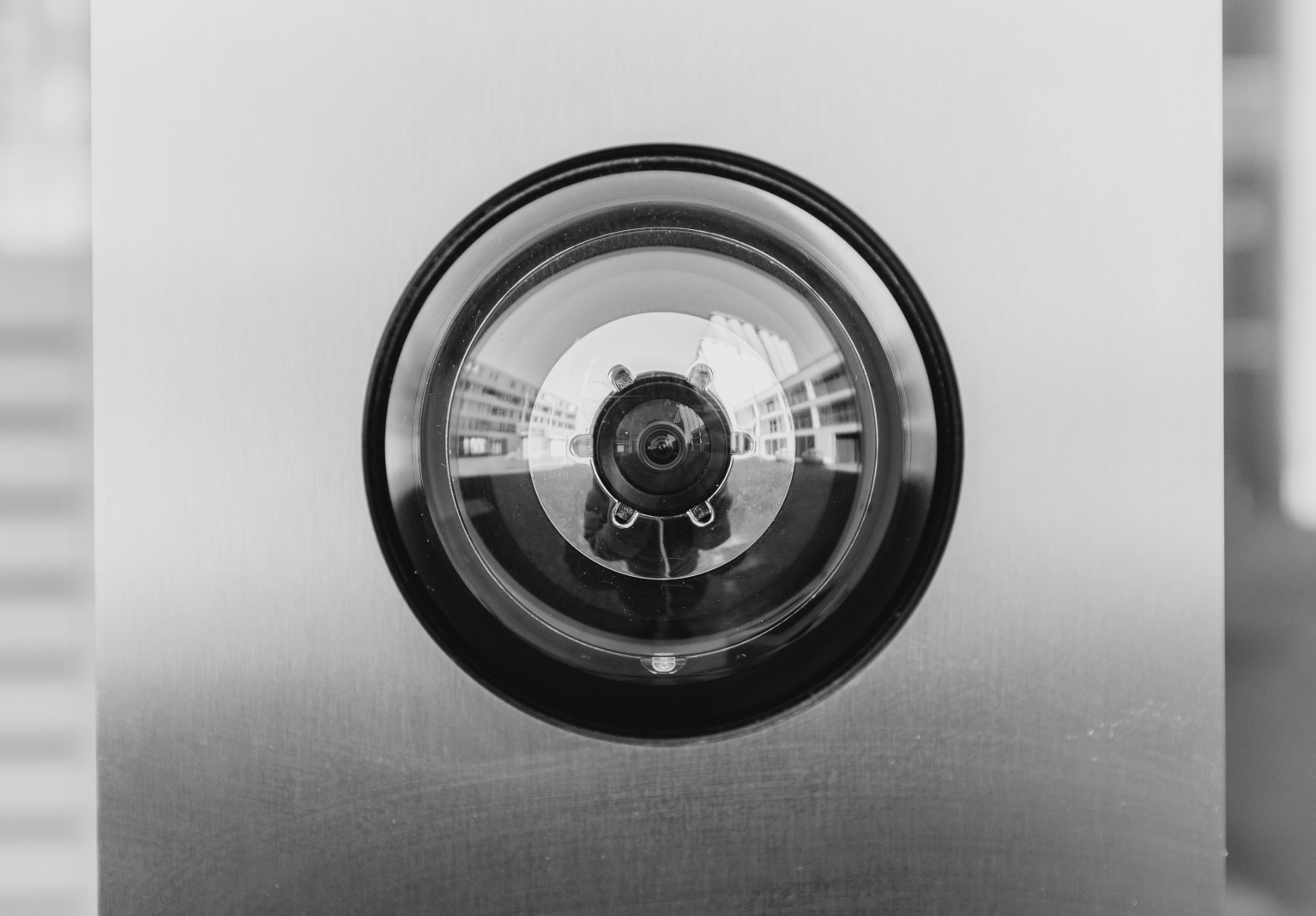 Close-up photo of a door camera lens